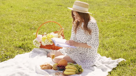 woman enjoying a beautiful summer picnic