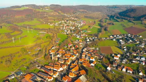 flight-over-small-village-in-the-countryside-on-a-sunny-afternoon