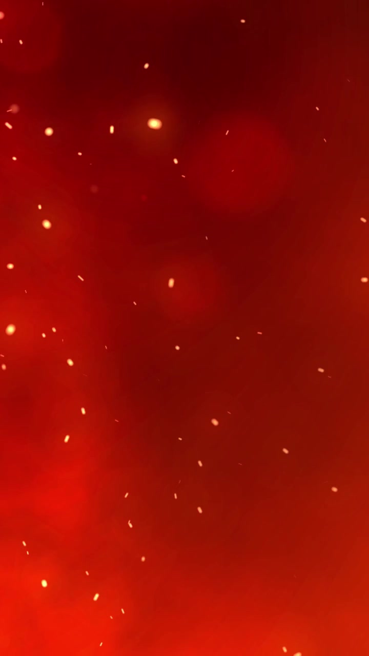 Braci incandescenti fluttuanti su uno sfondo rosso intenso