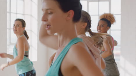 dance class group of multiracial people dancing practicing choreography moves training in fitness studio enjoying healthy active lifestyle