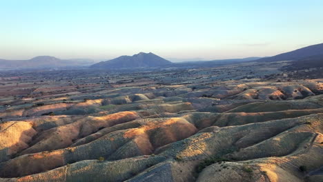 golden hills at sunset with fields in tequila, jalisco, mexico, captured from above