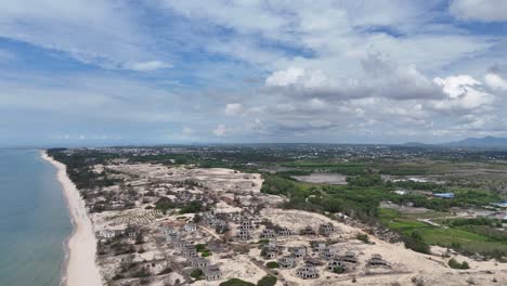 aerial view pan of the coast and the farms in la gi in the afternoon