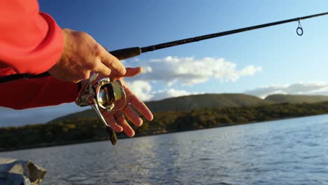 man fishing in river 4k