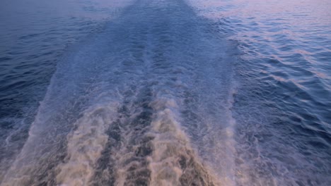 when the camera moves we discover a magnificent sunset light on board the boat which takes us to the cyclades in greece