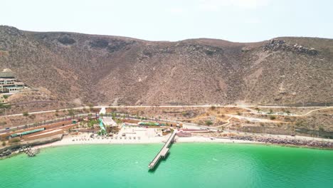 relaxed beach scene at playa coromuel, la paz with calm turquoise waters