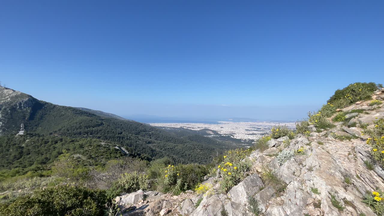 Scenic View of Athens from Mountain Peak of mount Hymettus, panning right wide angle shot