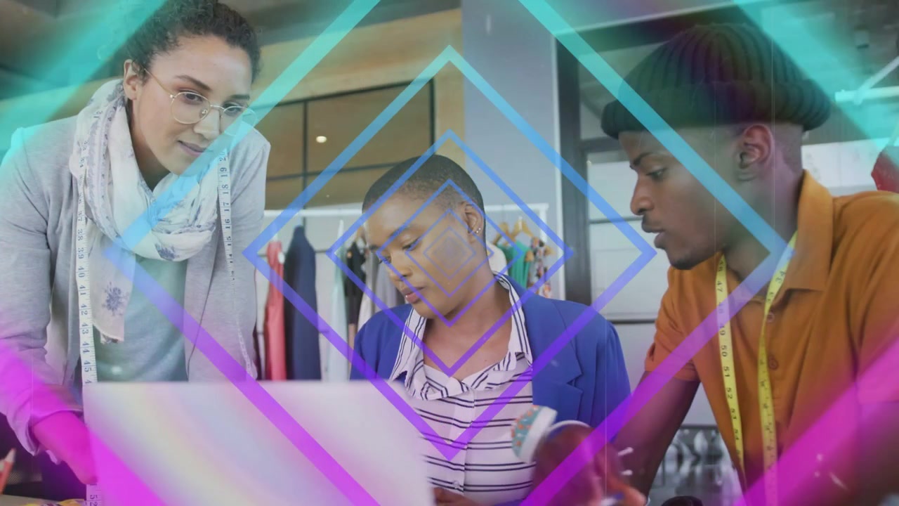 Left woman pointing at laptop, three fashion designers reviewing designs, neon diamonds sweeping