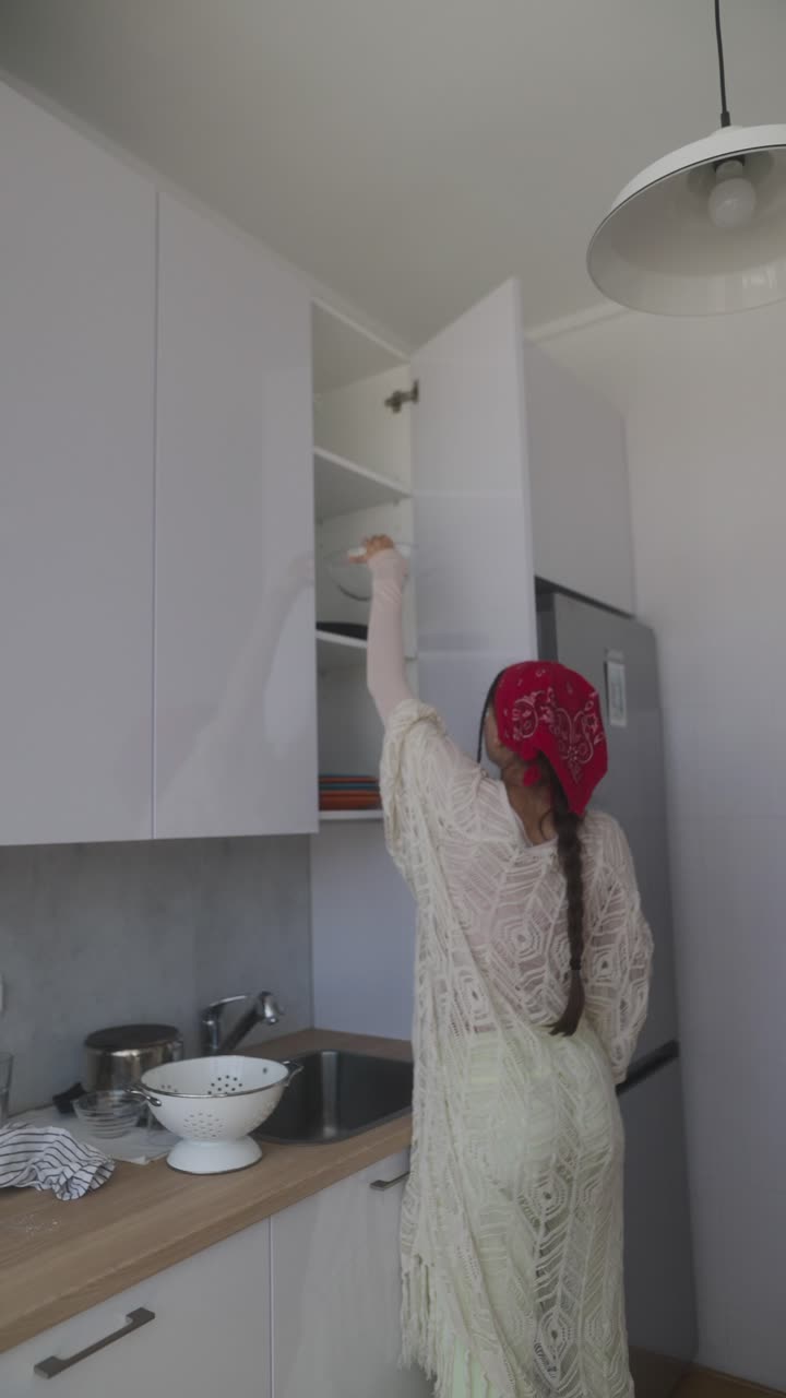 Woman and girl in a kitchen
