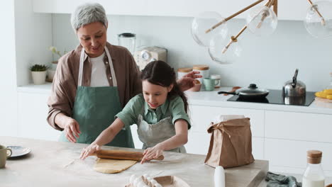 grandma and girl baking