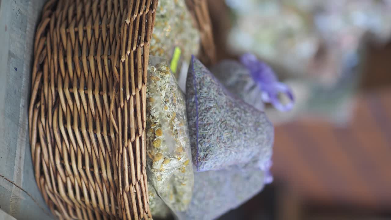 Basket filled with dried flowers and herbs