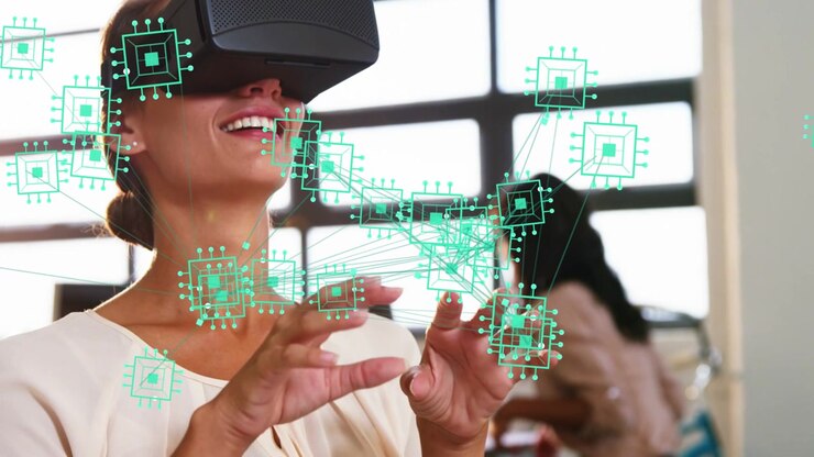 Woman wearing VR headset pinching then dragging teal network overlay, mapping office tech links
