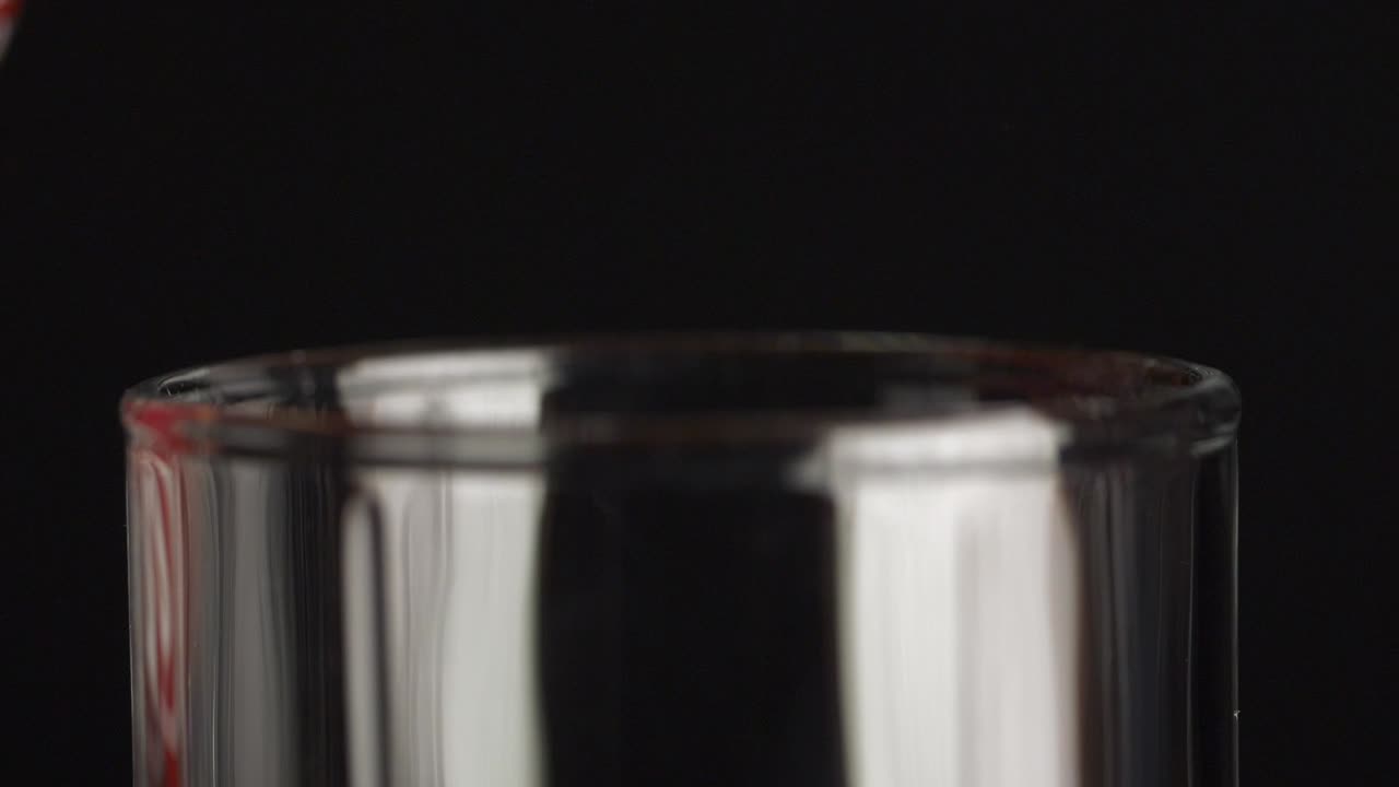 Pouring Christmas Soda into a Glass