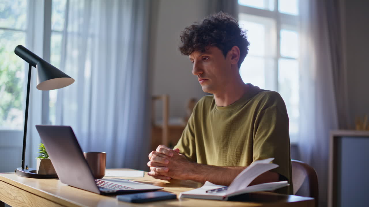 Casual businessman talking videocall flat closeup. Freelancer working computer