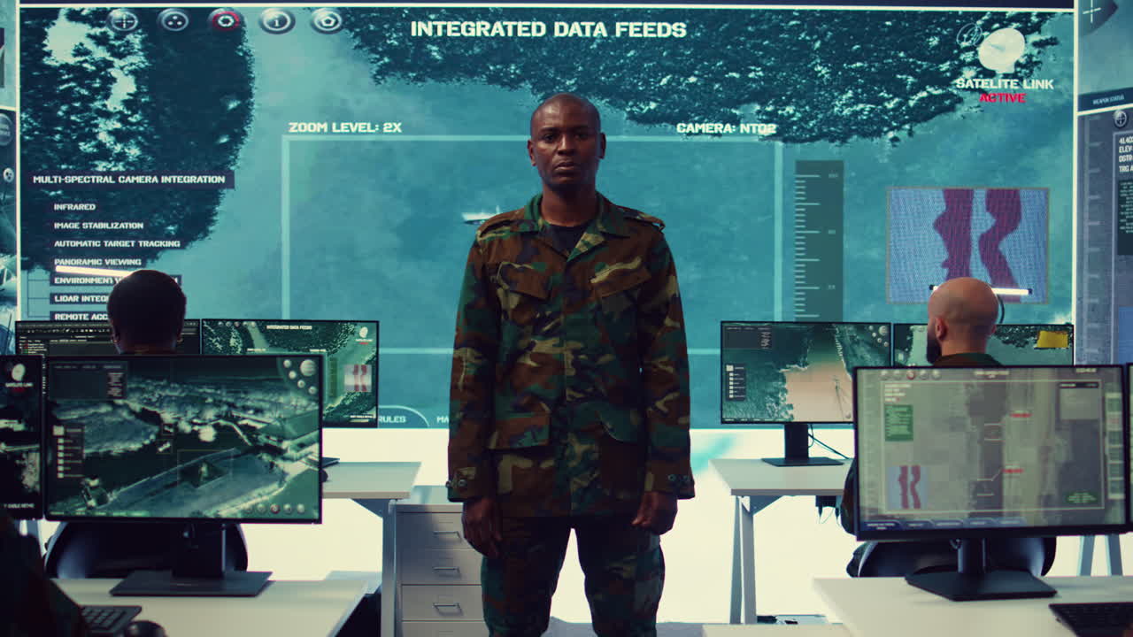 Portrait confident military general with camo uniform in mission control center