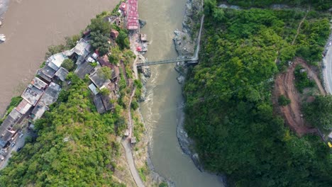 Two-rivers-getting-merged,-surrounded-by-mountains