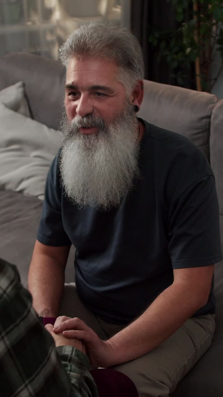 Man comforting another