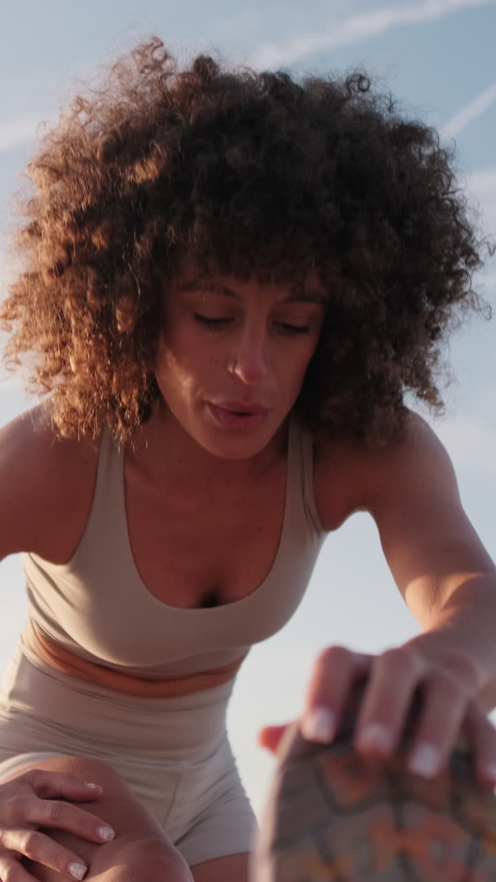 Young Woman Stretching Before Outdoor Workout