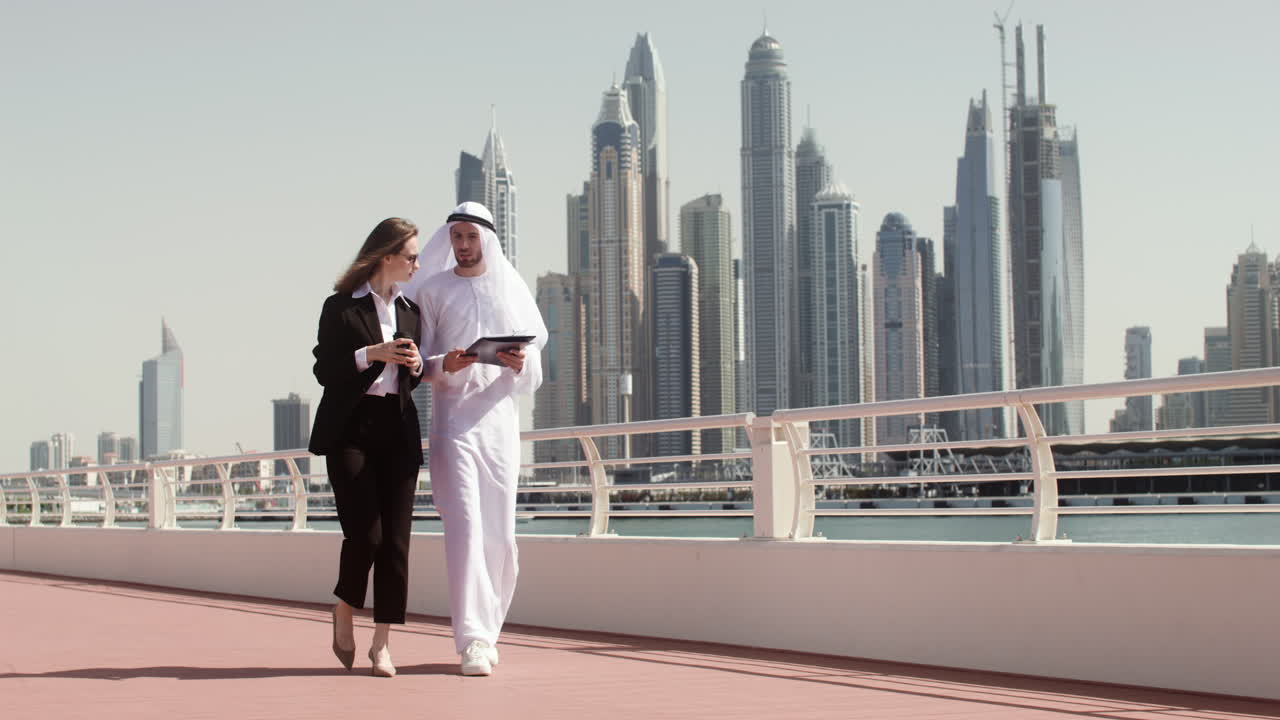 Two people talking about business