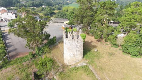 drone flying toward sarria fortress, battalions tower remain of a historical site, lugo. spain