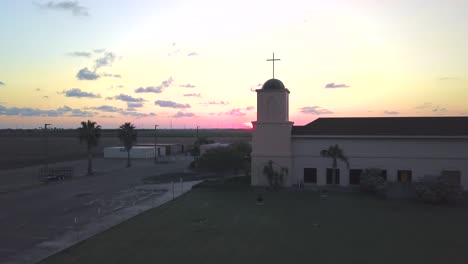 Sunsetting-by-a-church-in-Portland,-Texas