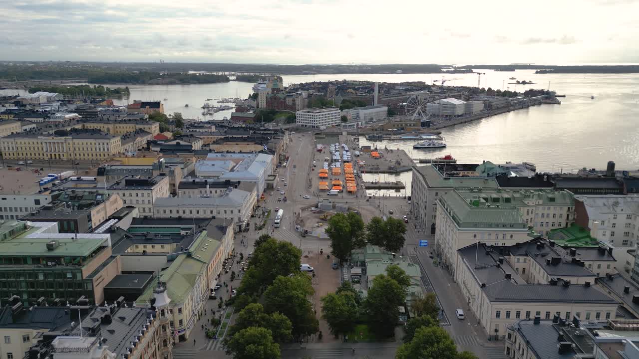 Slowly desceinding aerial drone view over southern part of the Helsinki downtown