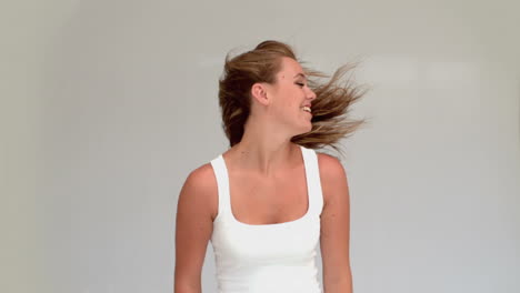 woman shaking her hair