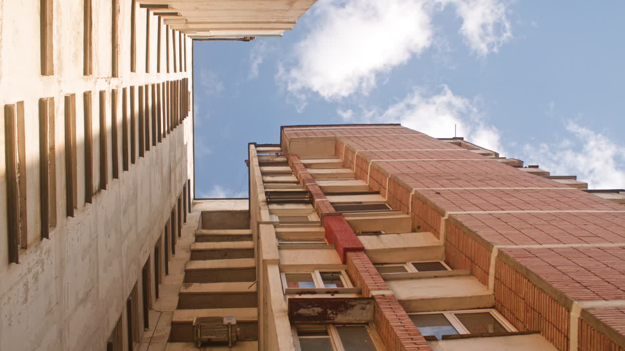 A brutalist, communist architecture high rise apartment building from the communist era in Eastern Europe