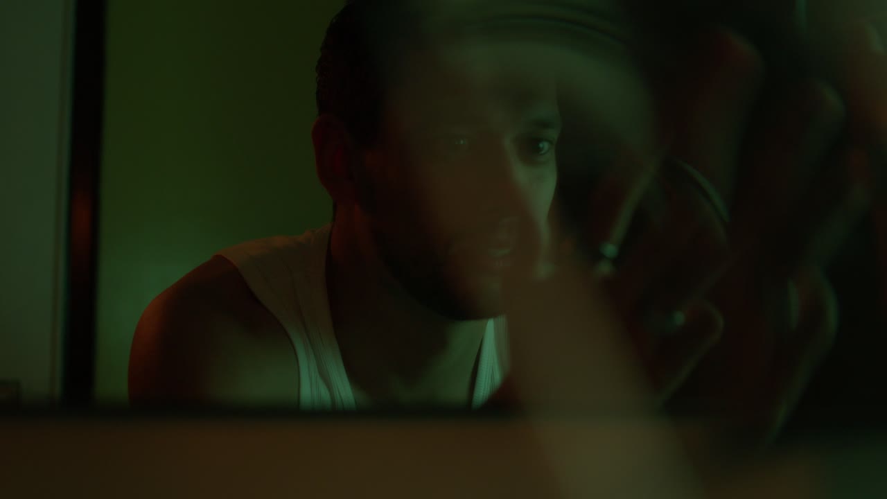 Man Reflecting on His Hands