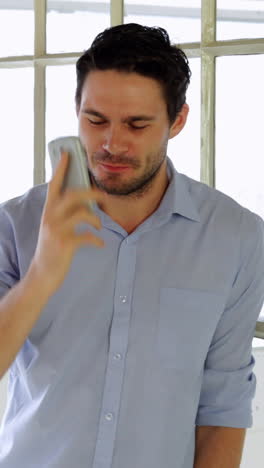 casual man having a phone call