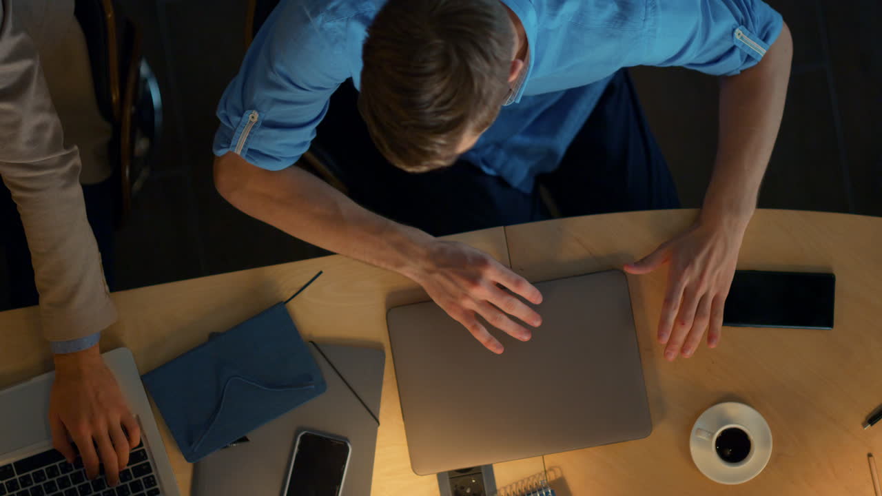 Business man working computer coworking. Overworked entrepreneur sitting table