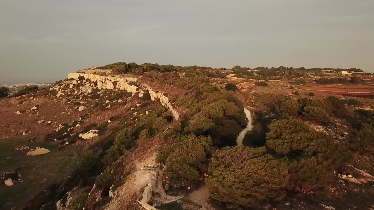 Aerial view of the Victoria Lines, Malta, Europe. Flying over the cliff and wall.
