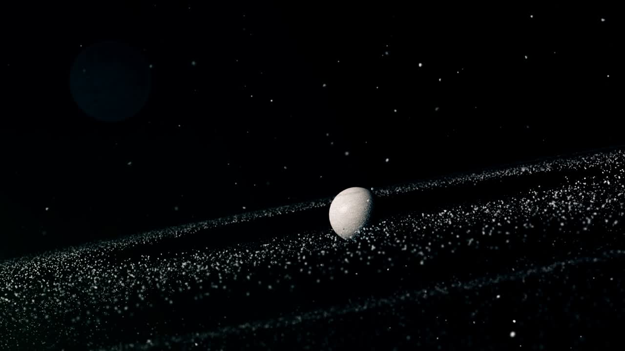 Planet in cosmos with ring formed from rocks and stones rotating around ...