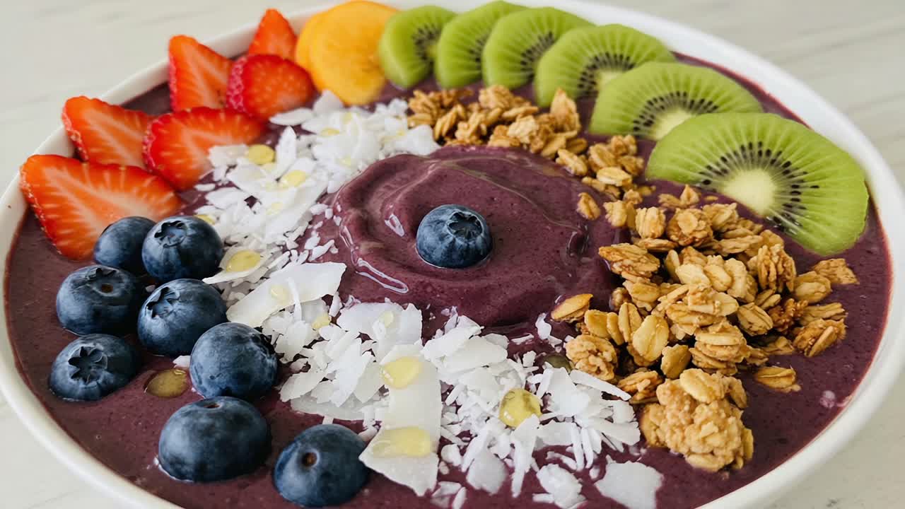 Vibrant Acai Bowl Decorated with Fresh Fruits, Granola, and Coconut for a Nutritious and Aesthetic Breakfast Experience