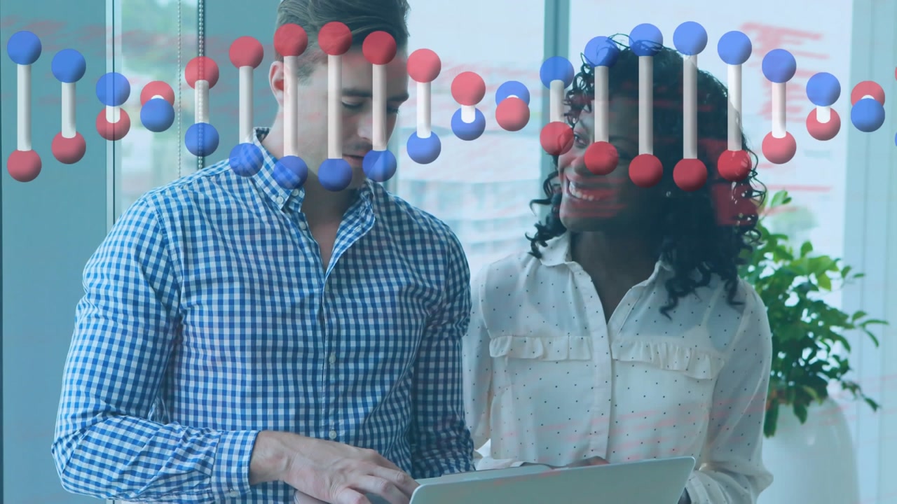 Animation of spinning dna structure over diverse man and woman discussing over a laptop at office