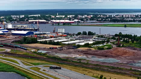 industrial zone of the port of riga, including ks terminal and a latvian propane gas export base, with extensive railway and shipping infrastructure for logistics - aerial