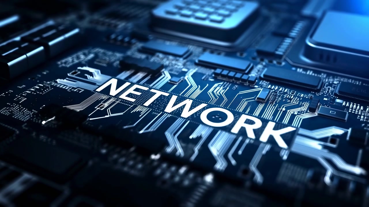 Close-up of a computer circuit board featuring a glowing network chip surrounded by electronic components in a dark blue technological setting