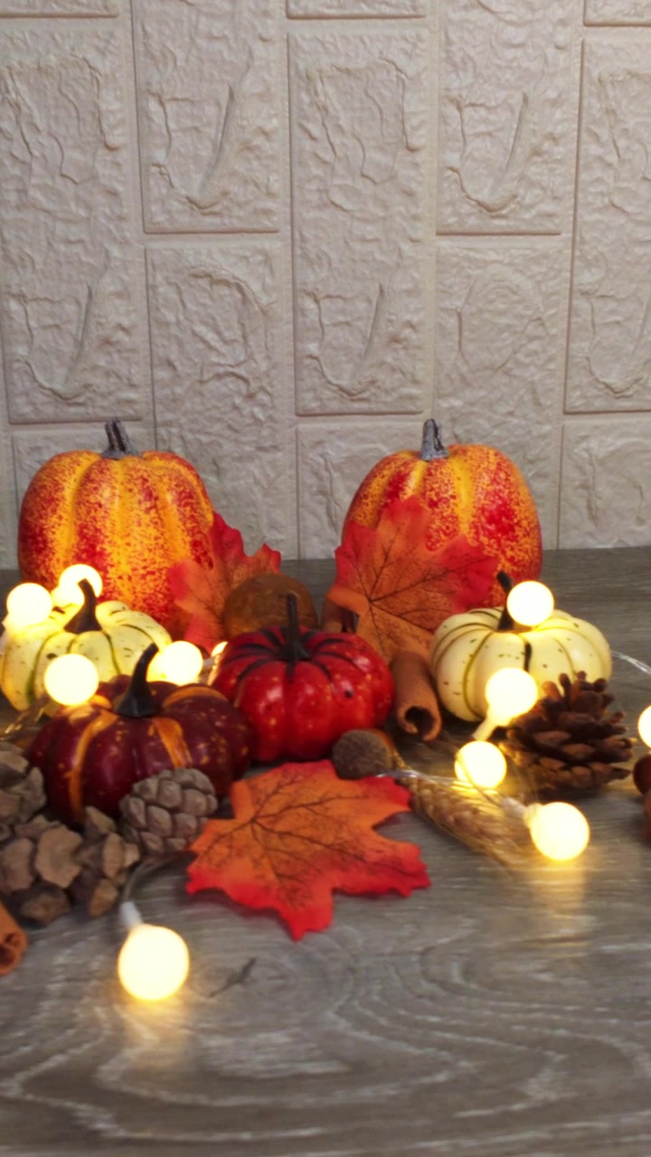 Autumnal Thanksgiving Decoration with Pumpkins and Fairy Lights