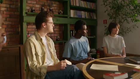 students studying in a cozy library setting