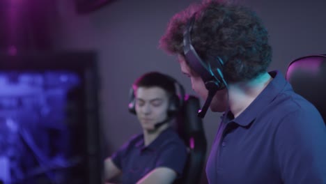 two guys winning round