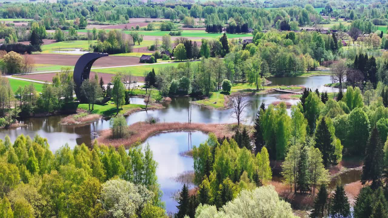 Kirkilai Karst Lakes and Observation Tower Within Birzai Regional Park, Lithuania. Aerial Drone Shot