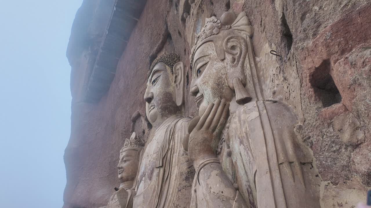 Maijishan Grottoes, Cliff Face Rock-cut Caves In Gansu Province, Northwest China. Low Angle Shot