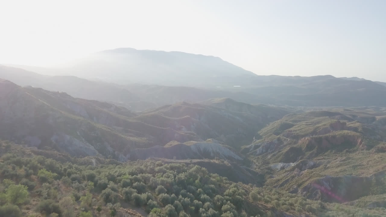 Sierra Nevada (Spain) mountain range - orchards with drone shot in 4k