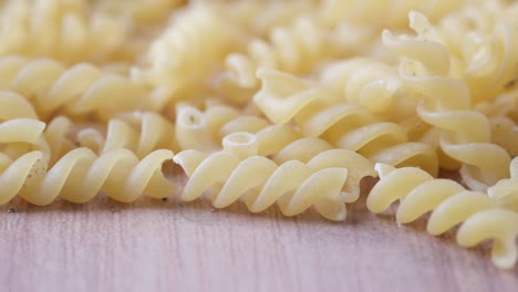 close-up of uncooked spiral pasta