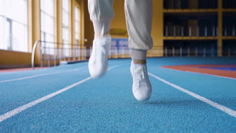 senior woman warming up indoors