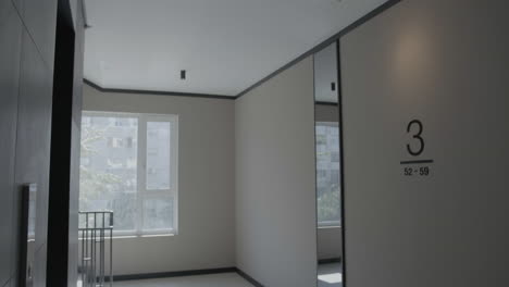 modern apartment hallway with city view
