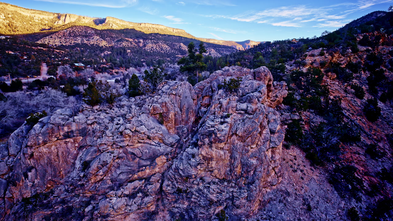 Aerial drone footage showcasing rugged red canyon terrain in New Mexico