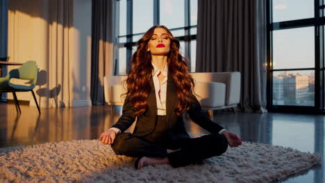 businesswoman meditating at home