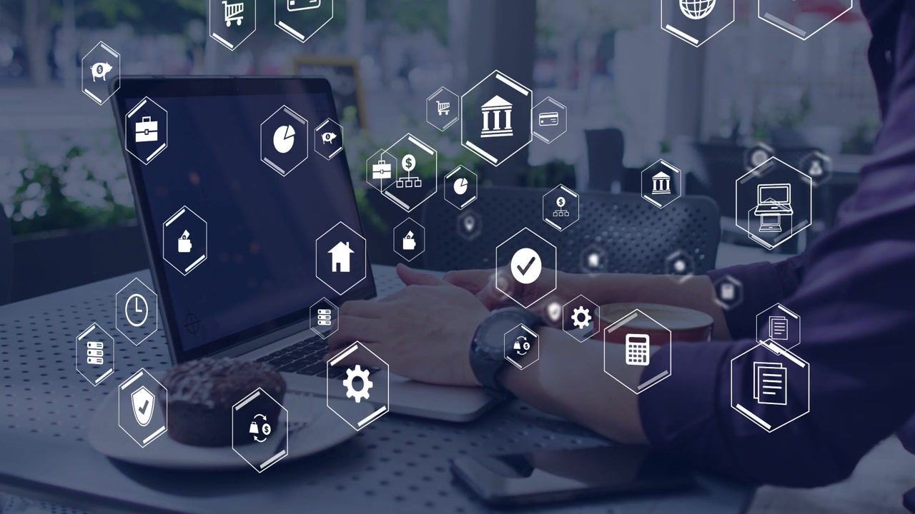 Mature male typing at cafe table, activating hex finance icons covering laptop hands analyzing data