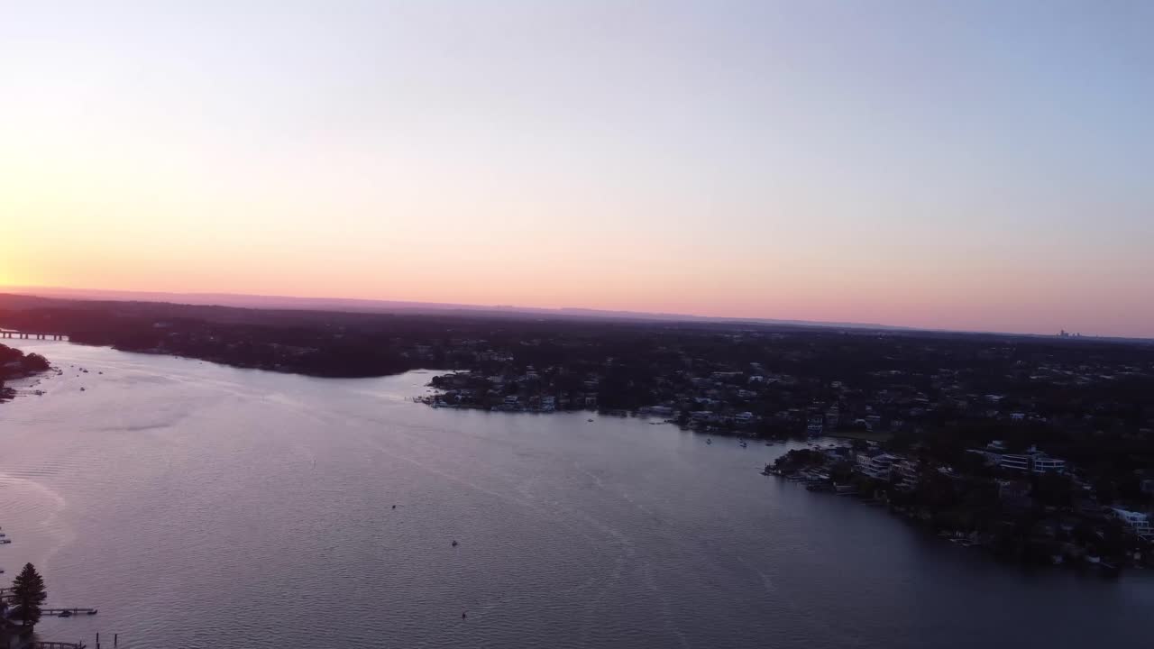 Aerial 4k 30fps Drone shot over sunset at Georges River, NSW.