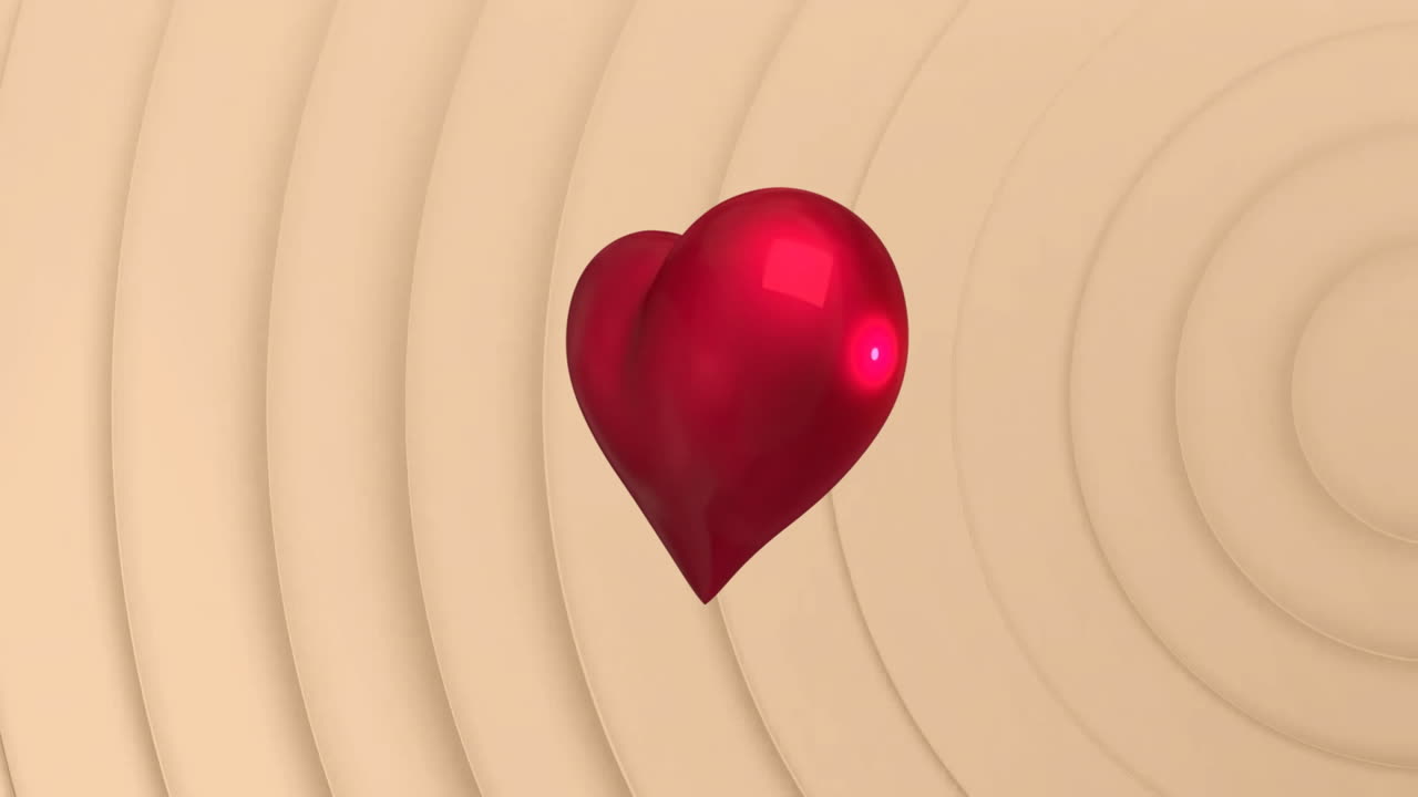 анимация вращающегося сердца на бежевом фоне